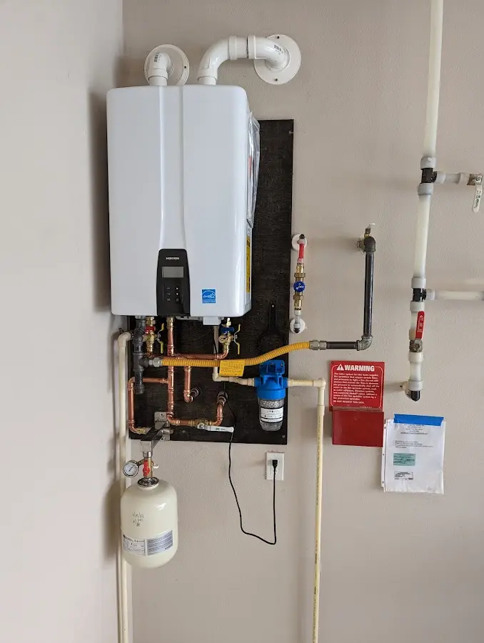 Professional plumber installing copper piping in a Harker Heights home